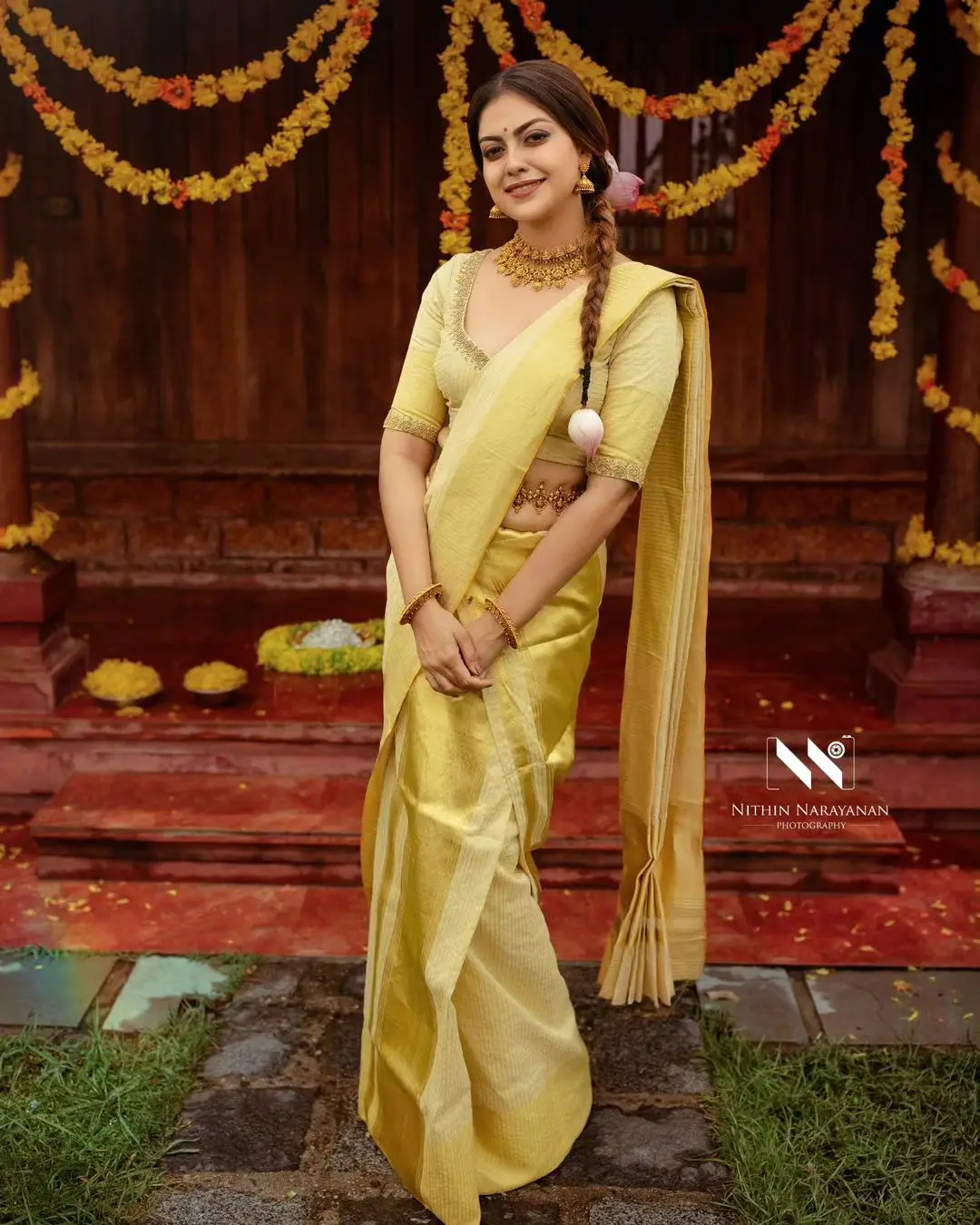 Anusree Nair Wearing Beautiful Earrings Jewellery Yellow Saree Blouse